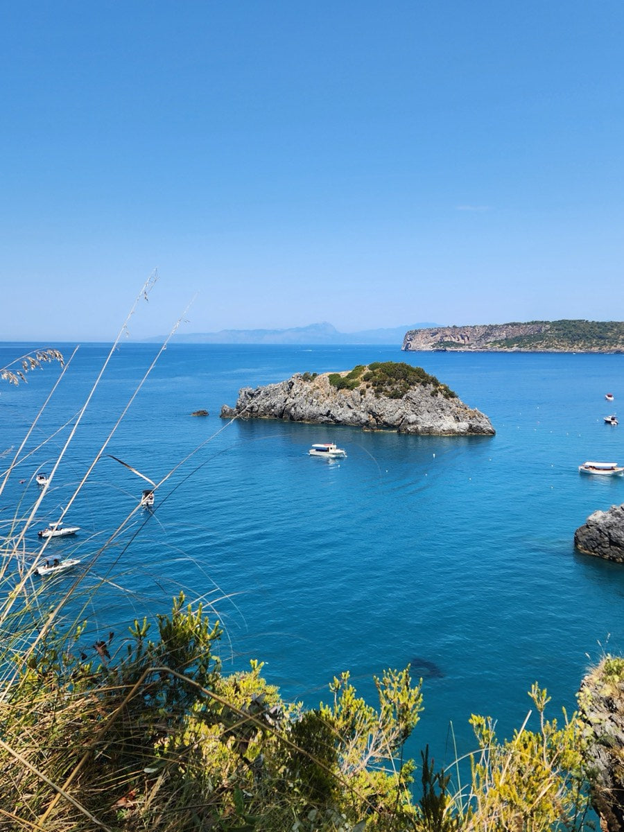 Turquoise water and fishing boats off the Costa Viola
