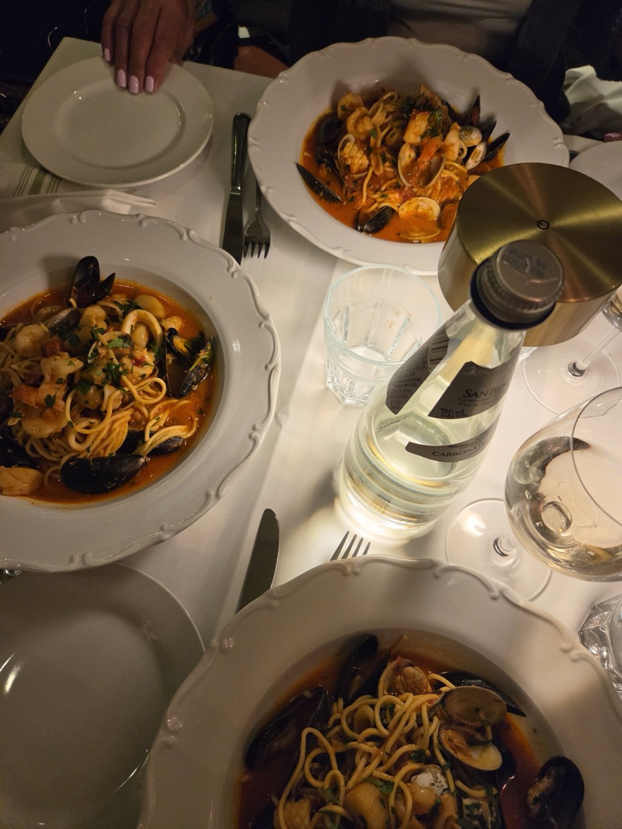 Seafood pasta served at a group dinner